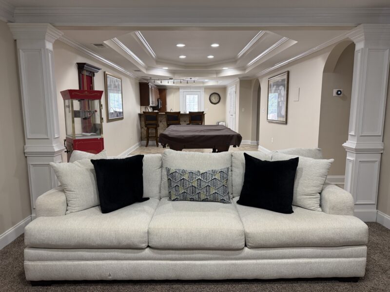 Full basement with 1 queen size bed, kitchenette, workout room with treadmill, family room with pool table.