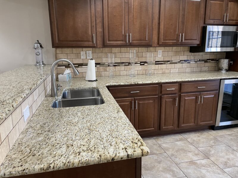 Full basement with 1 queen size bed, kitchenette, workout room with treadmill, family room with pool table.