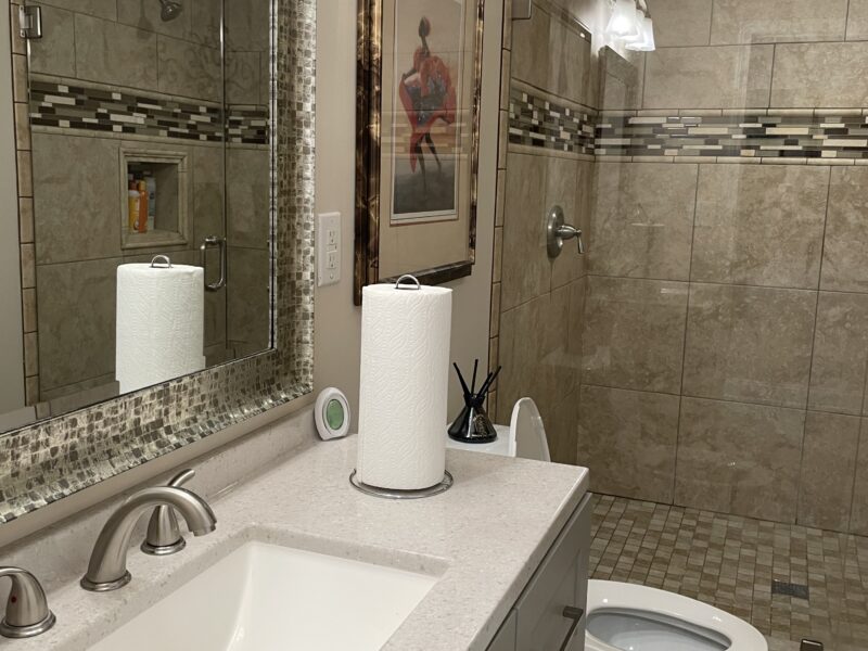 Full basement with 1 queen size bed, kitchenette, workout room with treadmill, family room with pool table.